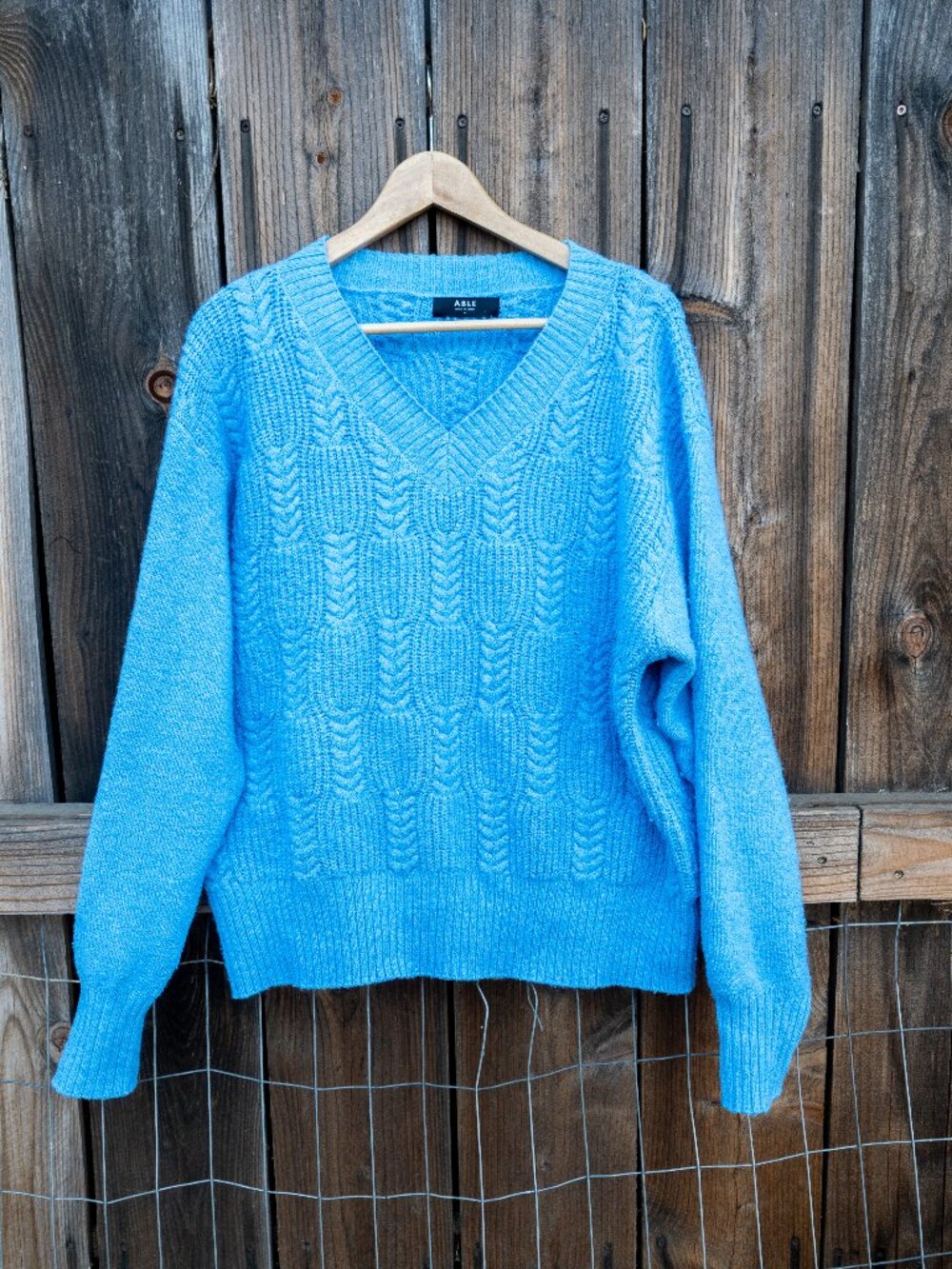ABLE Cable-knit V-Neck Sweater in Cerulean Blue